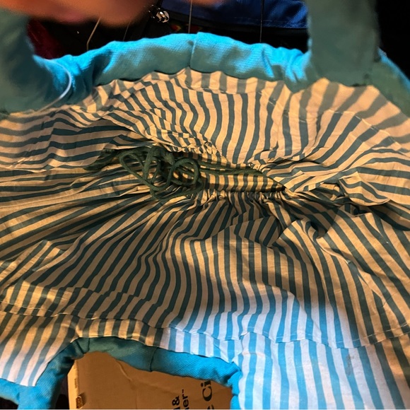 A Large, Thick Basket Bag with an Expandable Striped Cloth that’s says LOVE - Picture 4 of 7